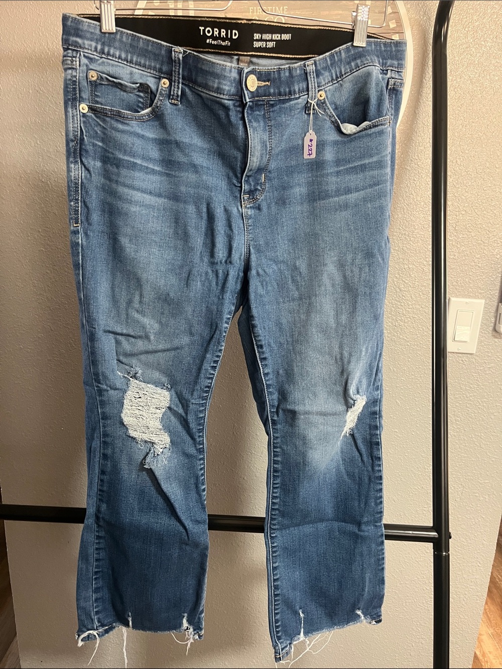 #227 Torrid Sky High Kick Boot Blue Ripped Jeans